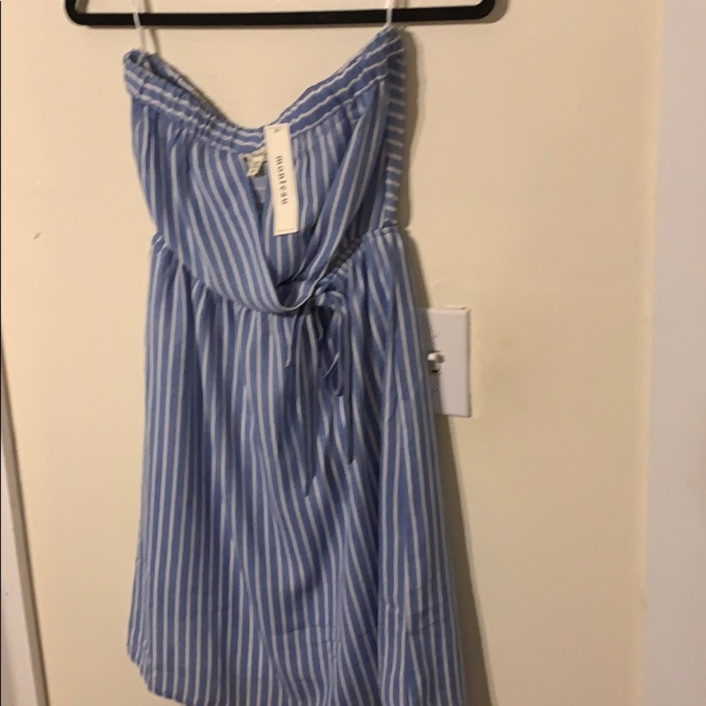 Strapless dress size “M”, new with tags.